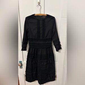Sara narvon
Black cotton ruffle dress
